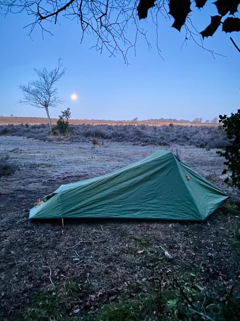 The OEX Phoxx 1 V2 set up in the New Forest clearing on a frosty morning and under a clear sky and full moon
