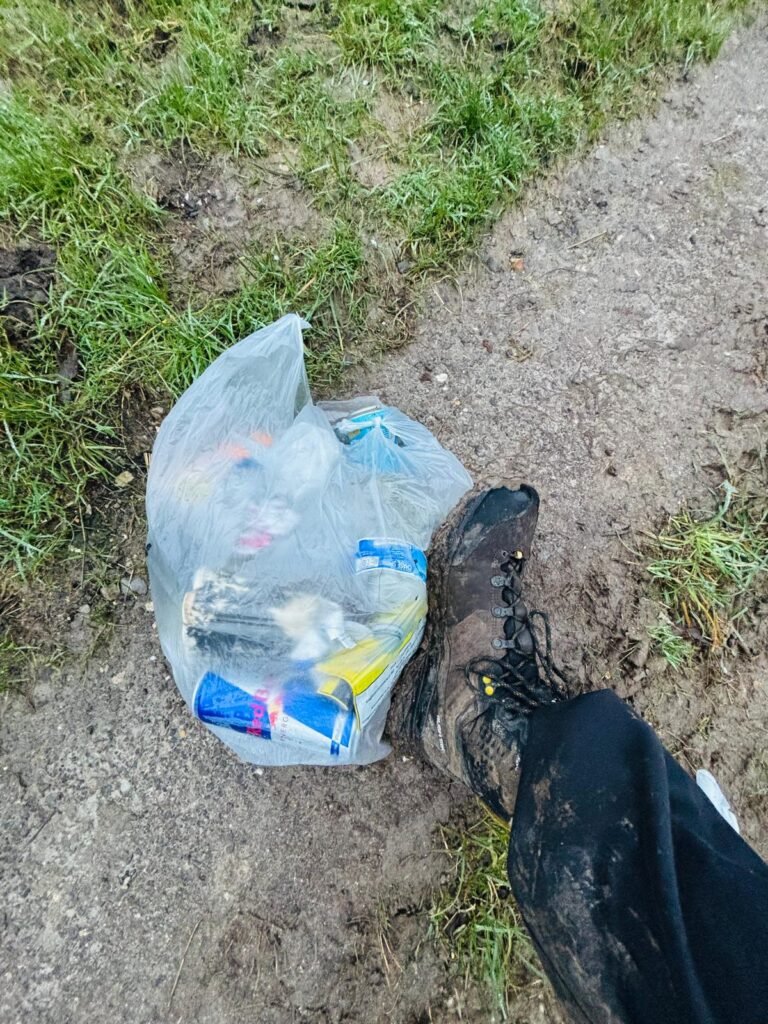 A full bag after a litter pick from St Catherine's Hill in Winchester, along side the size 11 Scarpa boots