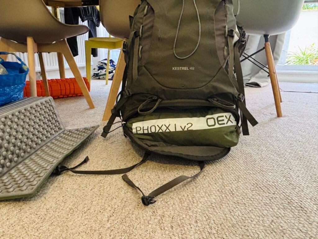 OEX Phoxx 1 V2 packed inside lower compartment of Osprey 48 litre backpack