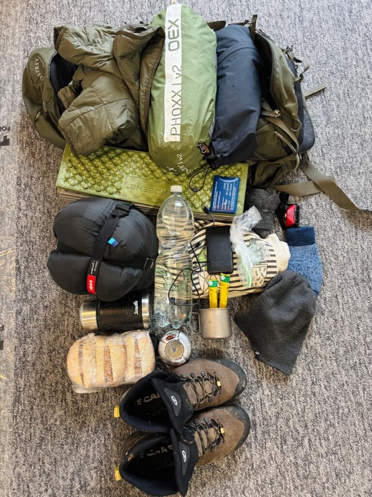 Wild camping kit laid out before packing for a one-night camp in England